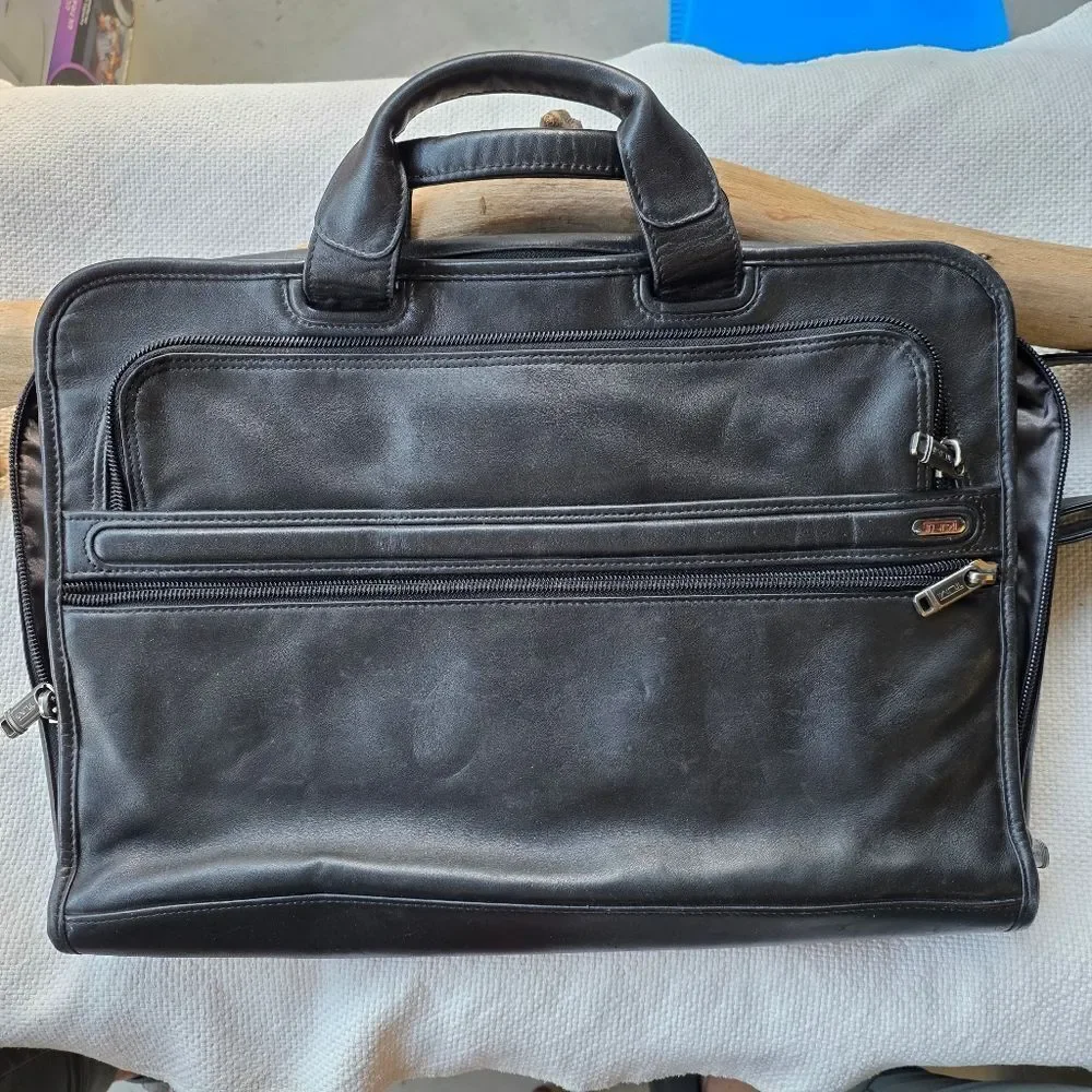 Tumi black leather briefcase